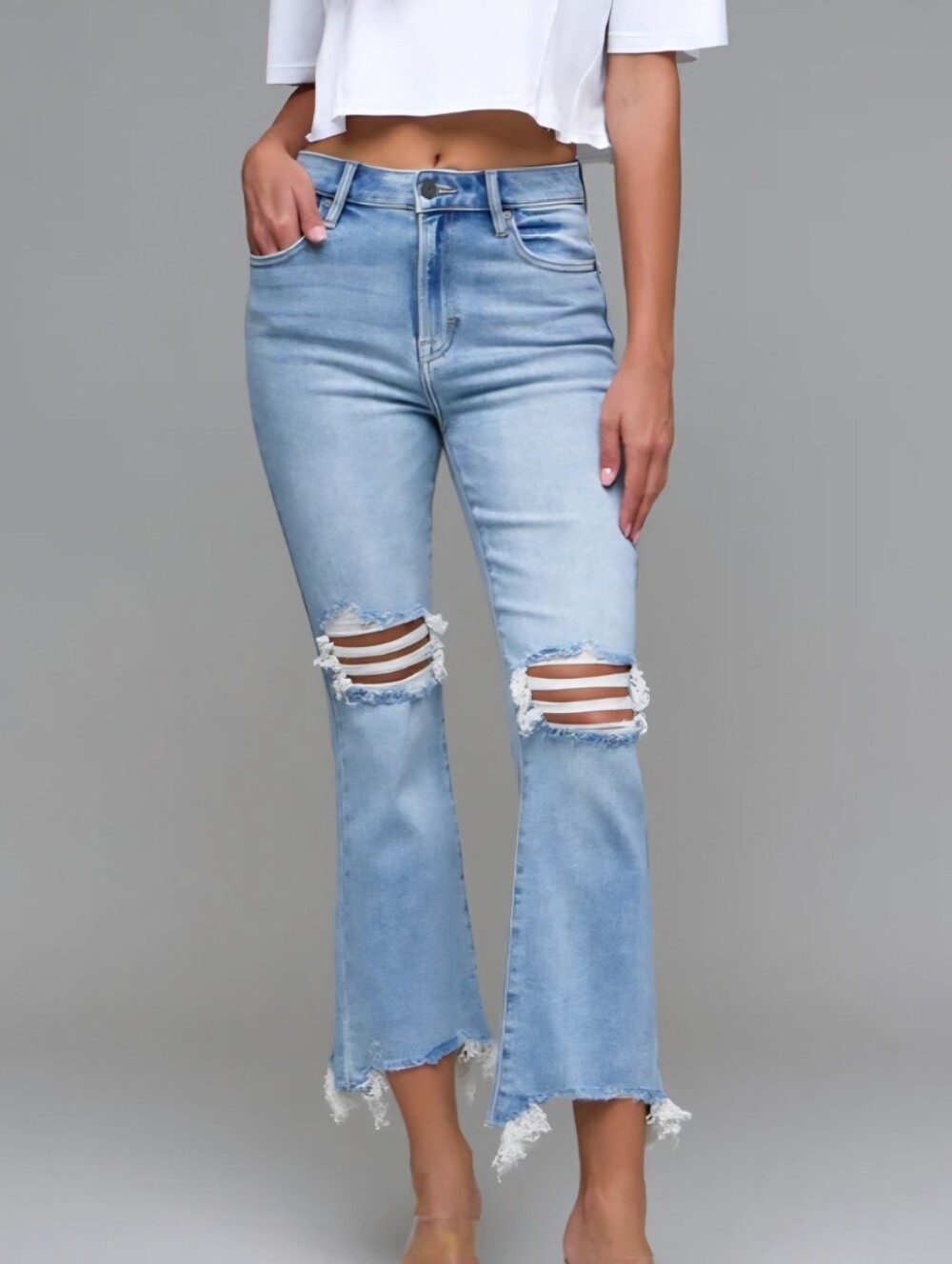 Light Blue Distressed Straight Leg Jeans with Raw Hem. Size 26